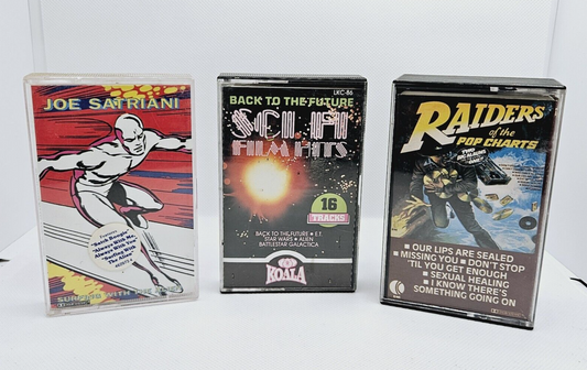 Surfing With The Alien / Sci Fi Film Hits / Raiders of the Pop Charts Cassette