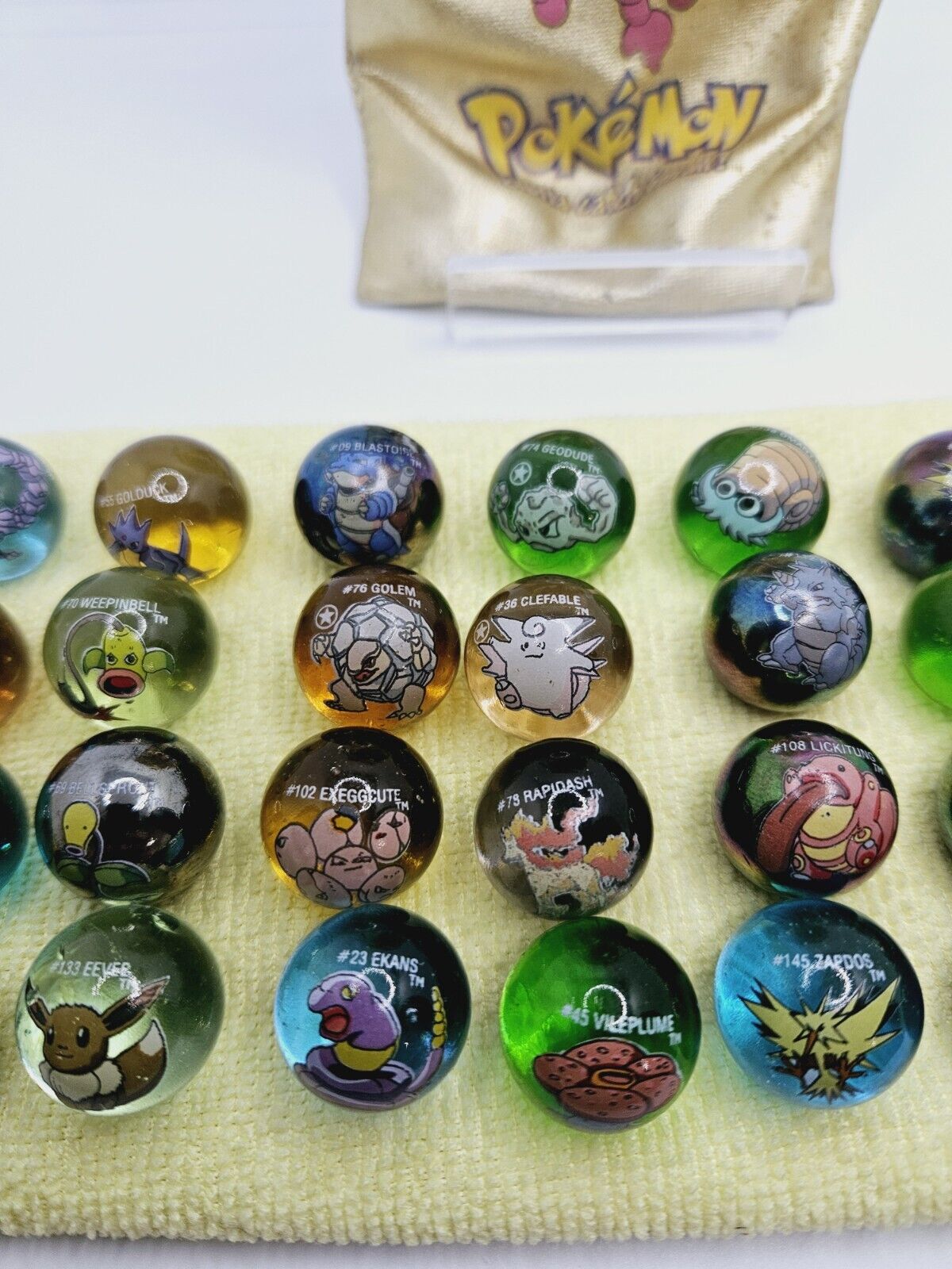 Vintage Pokémon Marbles Lot x 34 with #207 Gligar Gold Bag